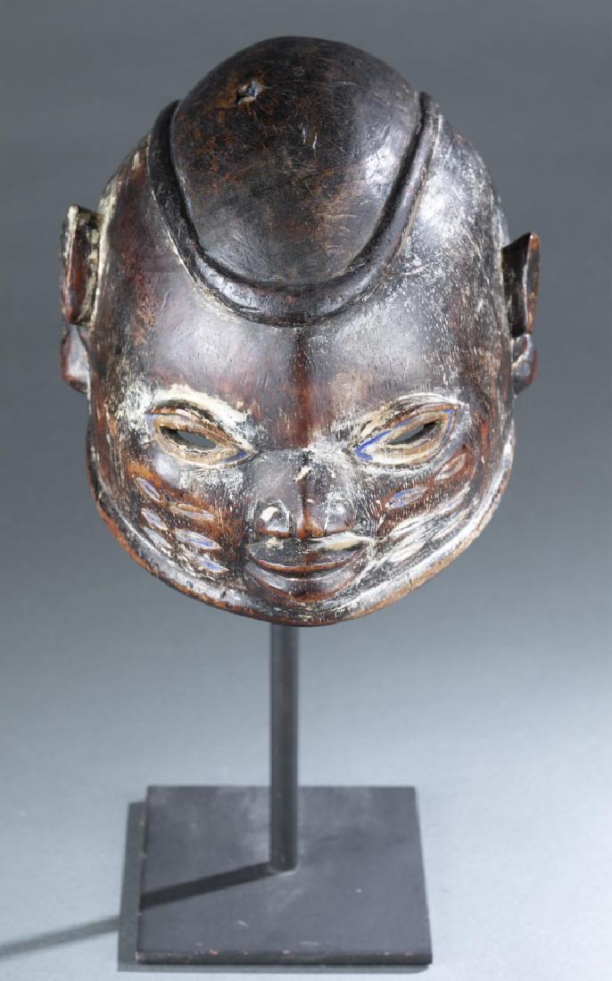 Yoruba Gelde mask. 20th century.: A Yoruba Gelde society mask. Yoruba. Nigeria. 20th century. 7" x 7 1/2" x 10 1/2"_x000D_ Condition: The absence of a condition statement does not indicate that the lot is in perfect condition, free fr