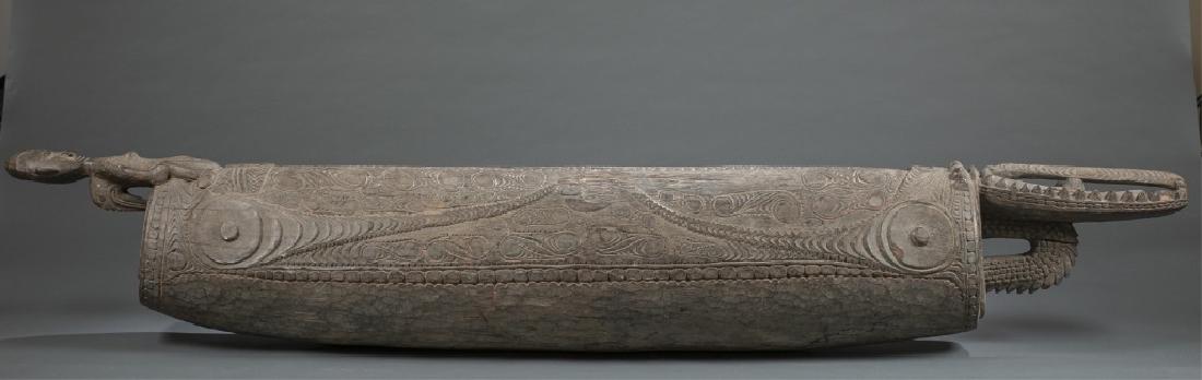 Middle Sepik slit drum. 20th century.: A Middle Sepik slit drum. Mid 20th century. Middle Sepik. Approximately 102" x 12." From the Estate of Lynda Cunningham, Philmont, NY.