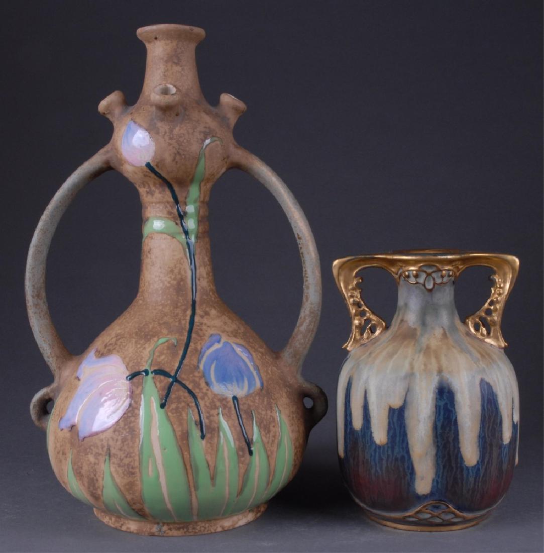2 Turn Teplitz Imperical Amphora vases, c 1900.: A group of two Turn Teplitz Imperial Amphora vases. Circa 1900. Austrian. Marked on bottom. ++ Imperial Amphora Florina vase. Enamel decoration depicting flowers. Some chips throughout consistent with