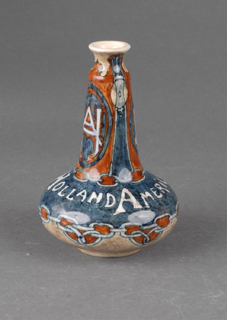 Jan Willem Mijnlieff, Holland America Line, c.1905: An Aardewerkfabriek Fayence-en Tegelfabriek Holland Pottery Piece. Circa 1905. Utrecht, Holland. A Holland America Line bud vase designed by Jan Willem Mijnlieff. Crazing throughout. Marked and signed