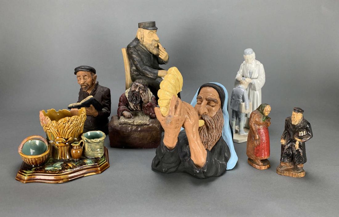 8 Figurines on Jewish Life.: [Decorative] 8 figurines relating to Jewish life and culture, portraying figures from a Jewish community. Includes: (1) Man in black walking with cane, book, and tassel. Height: 6 inches. Width: 2.5 i