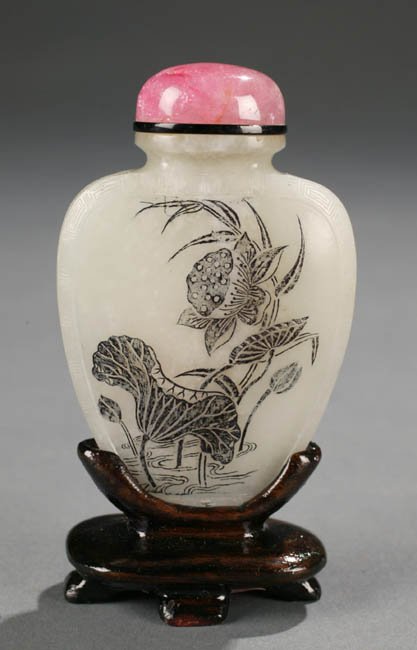 White nephrite Chinese snuff bottle with inci