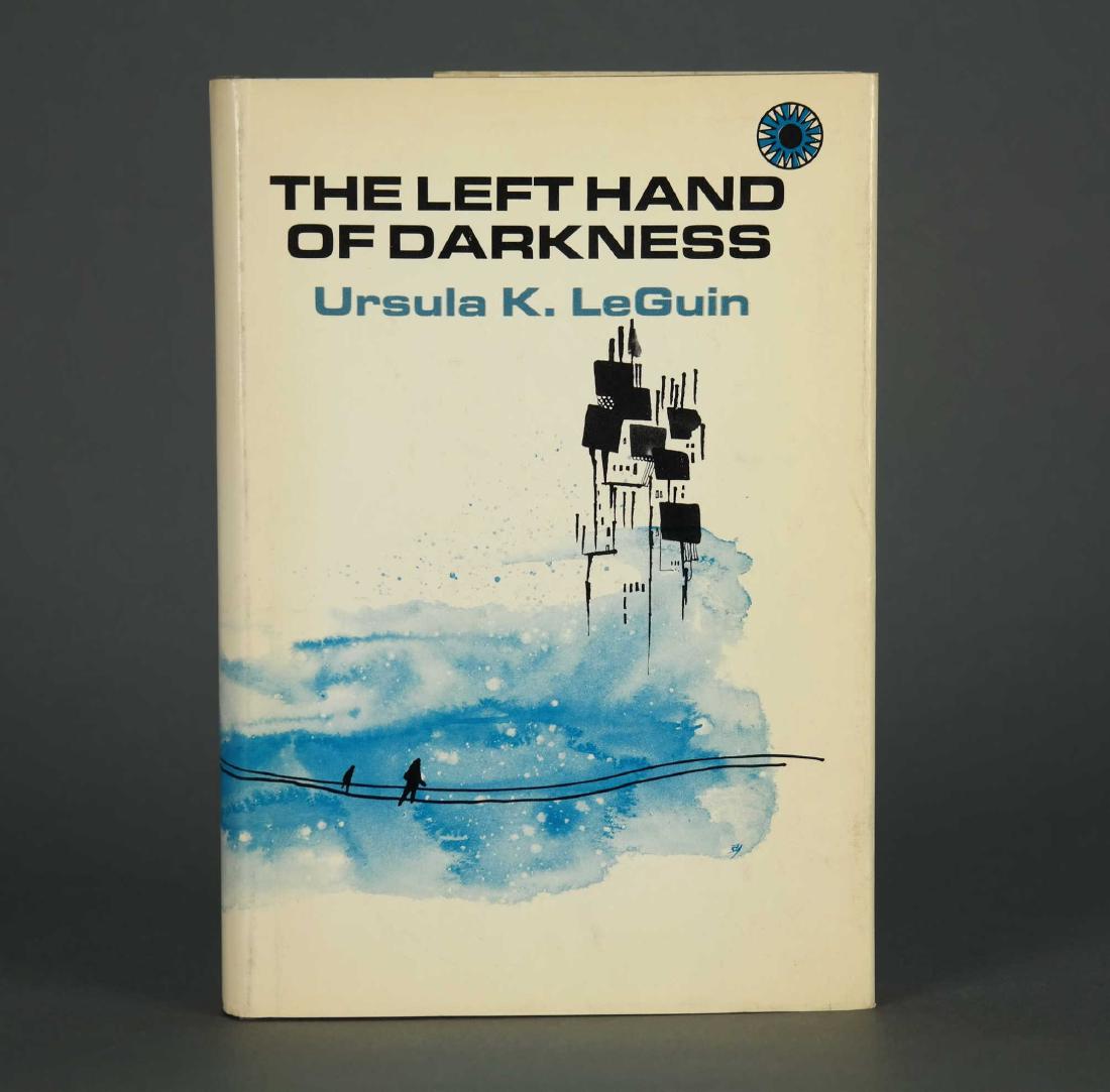 le Guin. The Left Hand of Darkness. 1st. 1969.: le Guin, Ursula K. The Left Hand of Darkness. Walker & Company, New York, 1969. 1st hardcover edition. 8vo. Grey boards. In original pictorial dust jacket. Top edge stained blue. The fourth Hainish no