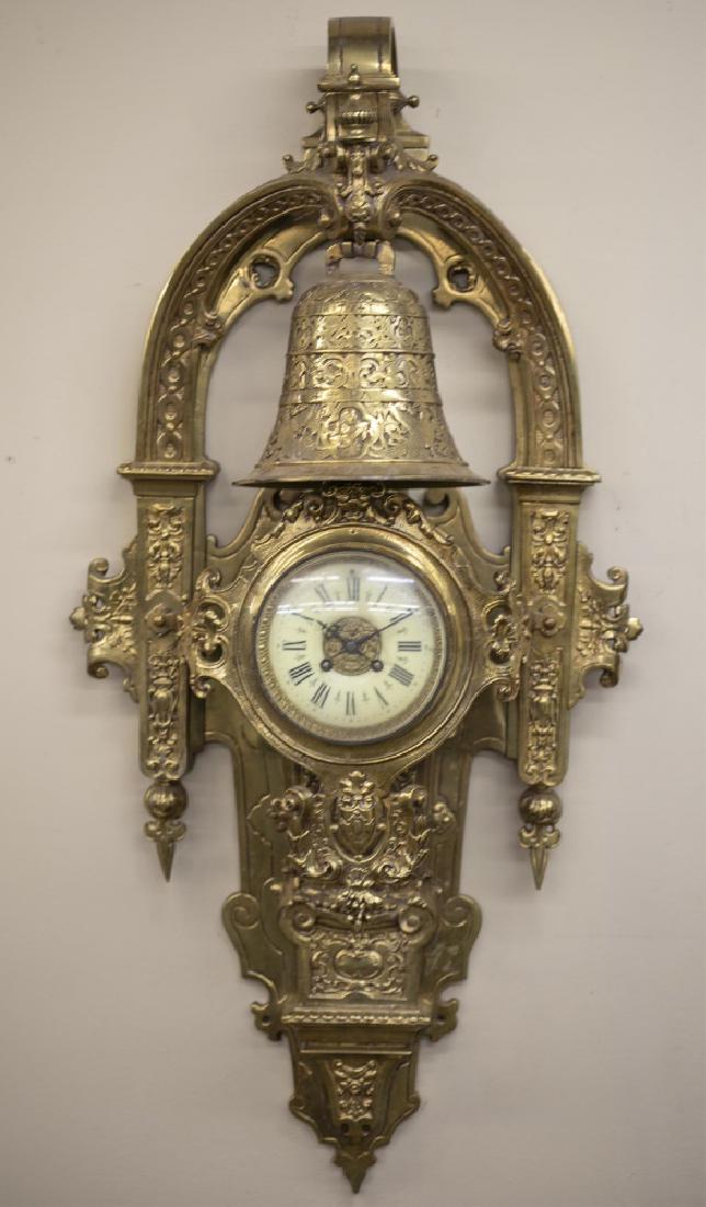 Napoleon III gilt bronze cartel clock, 19th c.: A Napoleon III gilt bronze cartel clock. 19th century. Baroque and Renaissance revival style design. Painted dial with Roman numerals. Pendant bell strike. 32" x 18 1/2" x 8 3/4".