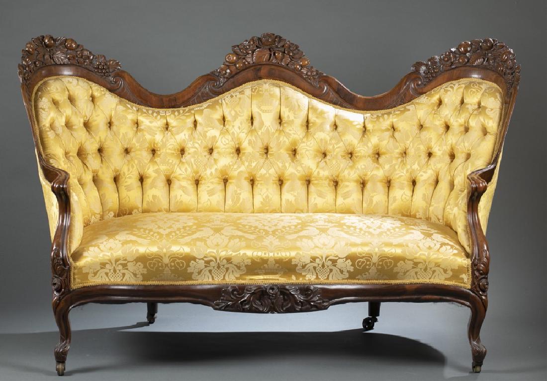 Belter, Laminated Rosewood, parlor sofa.: An American Rococo parlor sofa, John Henry Belter, laminated Rosewood "Rosalie with grapes". New York. Circa 1850-1860. Applied carved crest on serpentine seat. Tufted upholstered back. Carved cabriol