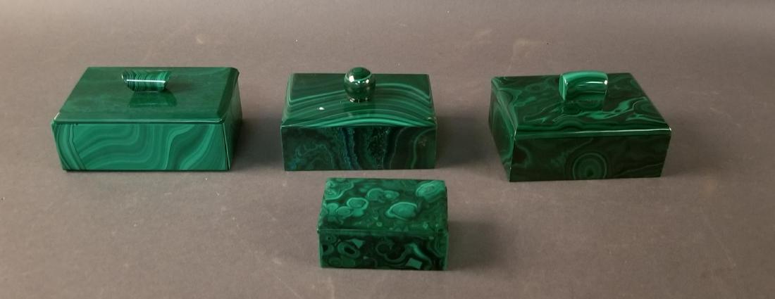 Four Malachite Lidded Boxes: Four Malachite Lidded Boxes ++ smallest box has repair to lid. Largest 3" x 3" x 4.5"
