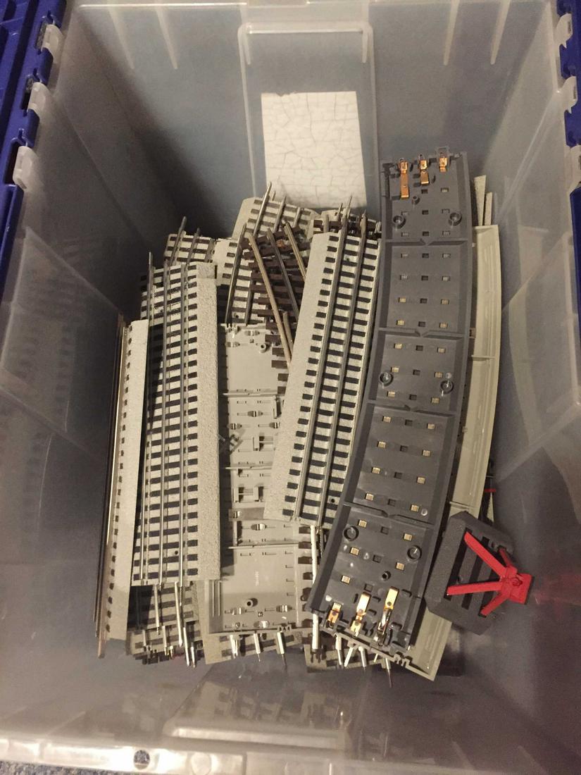 One plastic box of MTH Electric Tracks.: One medium plastic box of modern MTH electric tracks.