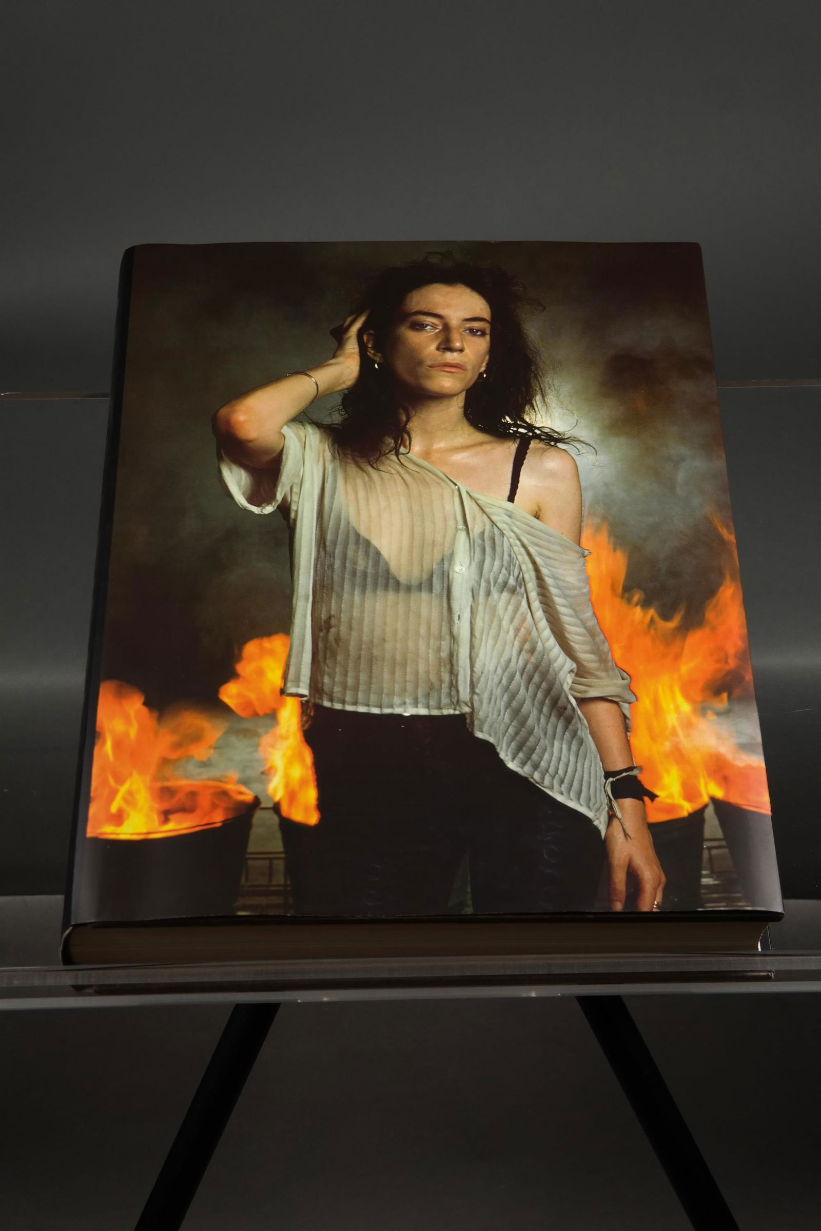 Annie Leibovitz. #4135/10,300: [Photography] Leibovitz, Annie. #4135/10,300. Signed and numbered by Leibovitz. Folio. 19.7" x 27.2". Hardcover in dustjacket featuring Patti Smith with 8 fold-outs. In original box. Smaller, shrink w