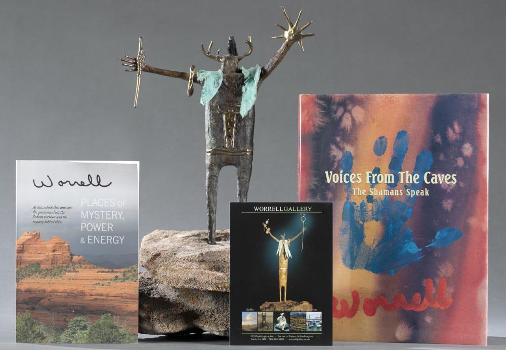 Bill Worrell, Shaman bronze, 1990.: Worrell, Bill (American b.1936). Shaman series. 1990. Bronze. Stylized Shaman figure with antlers and bird on head. Outstretched arms with stylized sun in left hand, wrapped stick in right hand. Shawl
