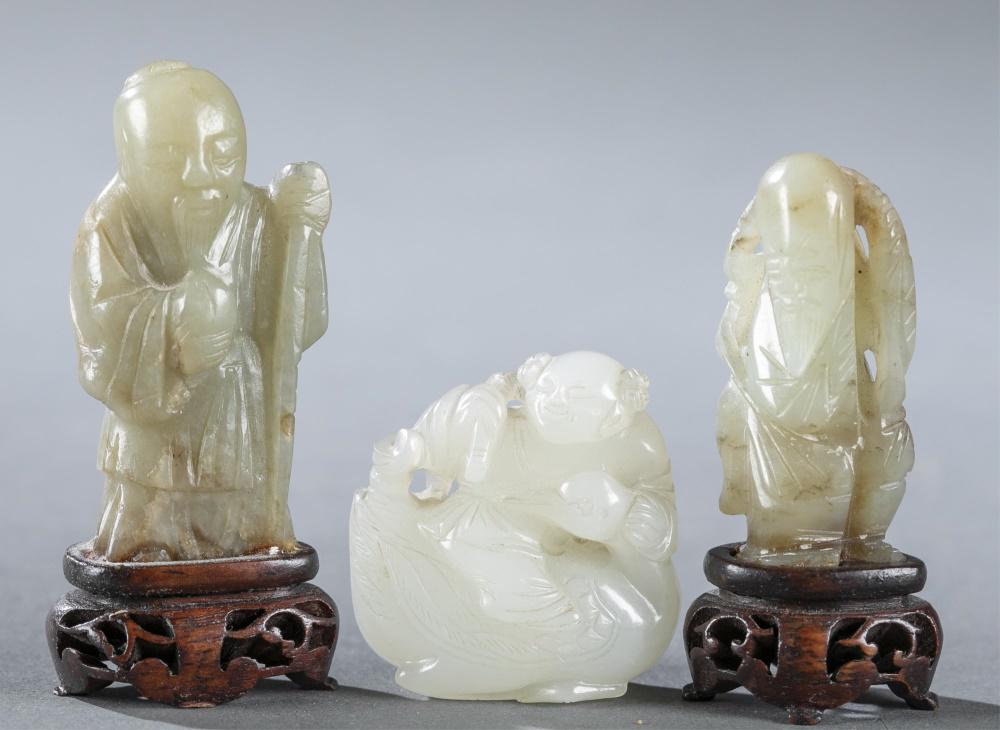 3 Small Japanese carved hardstone sculpture.: A group of three small Japanese carved sculptures. ++ Hardstone immortal holding the peach of longevity in one hand and a staff in the other. Attached to wooden base. With base: 2 7/8" x 1 1/4" x 3/4"