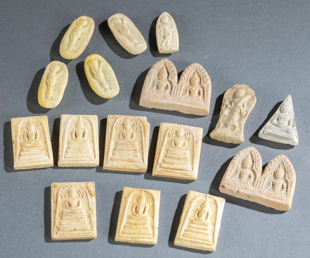 16 Small South East Asian Buddhist Votive Plaques: A group if sixteen Thai Buddhist votive plaques. Molded pottery plaques with standing or seated Sukhothai style Buddhas. Largest: 1 1/2" x 1 3/4". Smallest: 1 3/8" x 1/4".