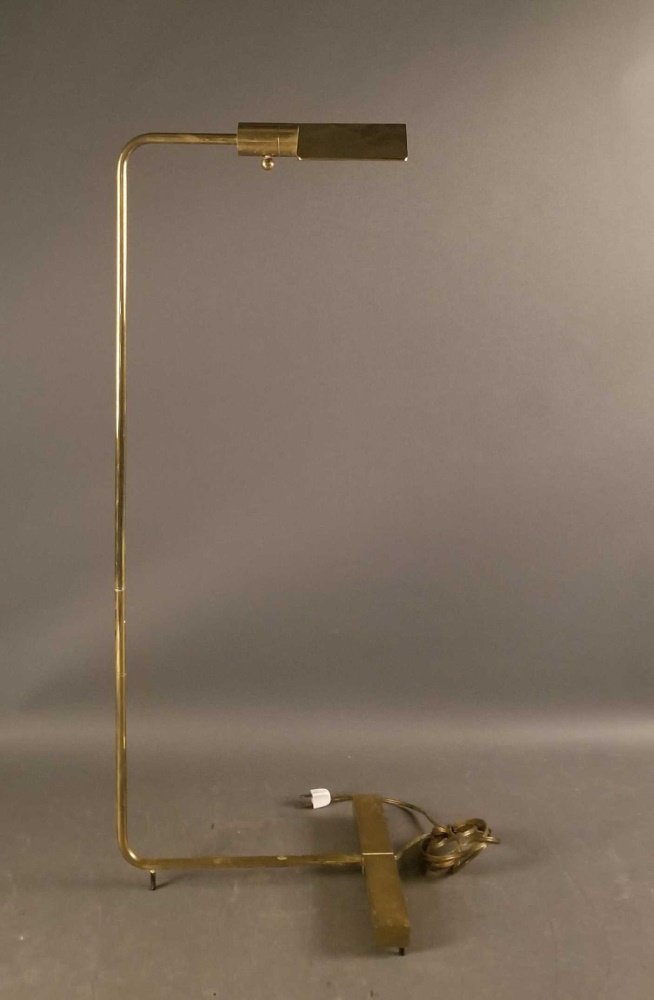 Cedric Hartman, brass floor lamp.: Cedric Hartman (American, b.1929). Brass adjustable floor lamp. Signed on base and marked "Cedric Hartman" and "810054." 36" x 11" x 13 1/2".
