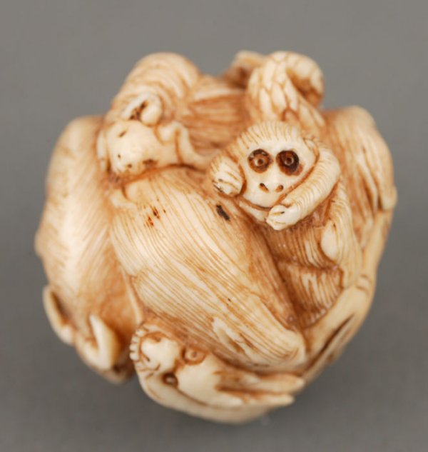 Elephant ivory carved netsuke depicting animals