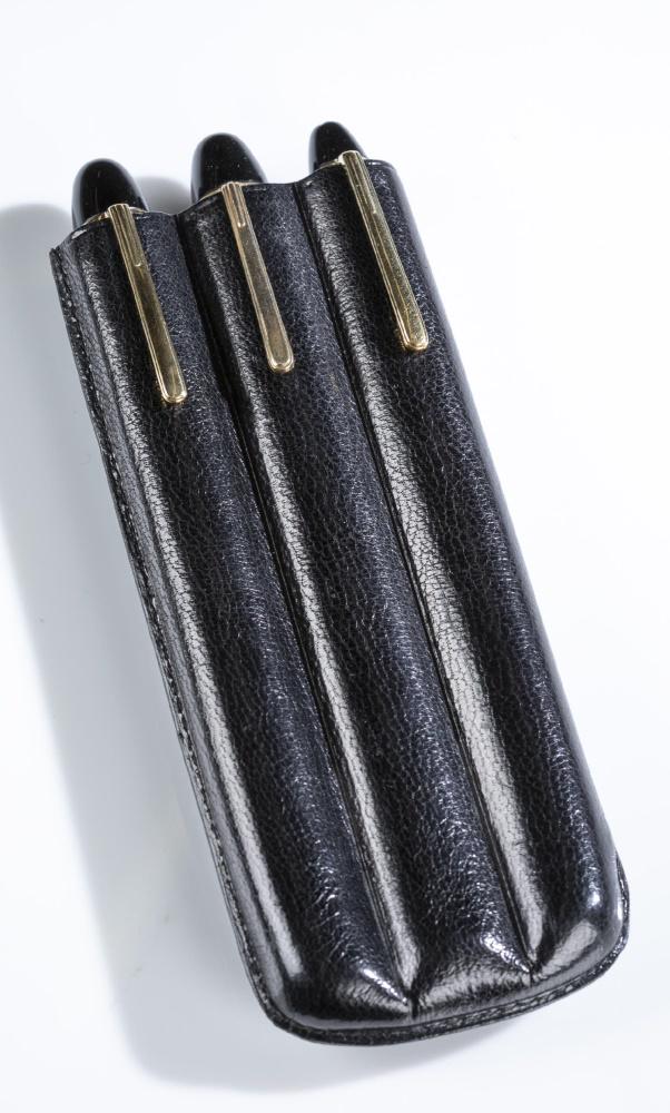 3 MontBlanc fountain pens.: A group of three MontBlanc Meisterstuck fountain pens. Each has a black body with gold tone details and 14k gold nib. Marked on center of each "MontBlanc." Black pen holder included. Length of first t