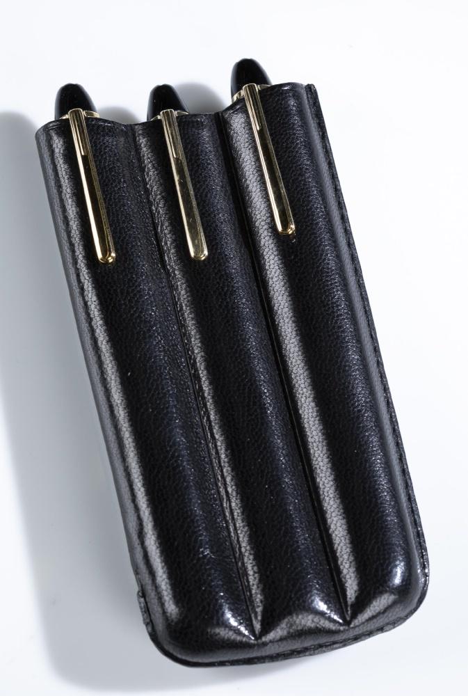 3 MontBlanc fountain pens.: A set of three MontBlanc Meisterstuck fountain pens. Each has a black body with gold tone detailsand 14k gold nib. Marked on center of each "MontBlanc." Made in Germany. Black pen holder included. Len