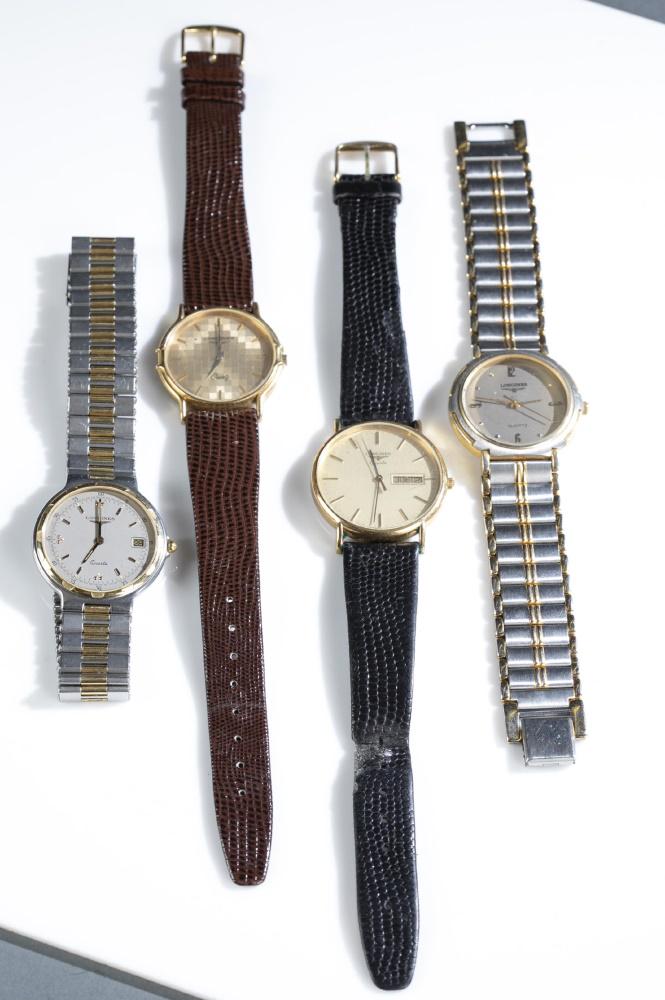 4 Longines gold tone wristwatches.: A group of four Longines wristwatches. ++ Longines quartz wristwatch with Champaign face and calendar window in gold tone case. Black leather band. "24663689" marked on back. Open: 9". ++ Longines qua