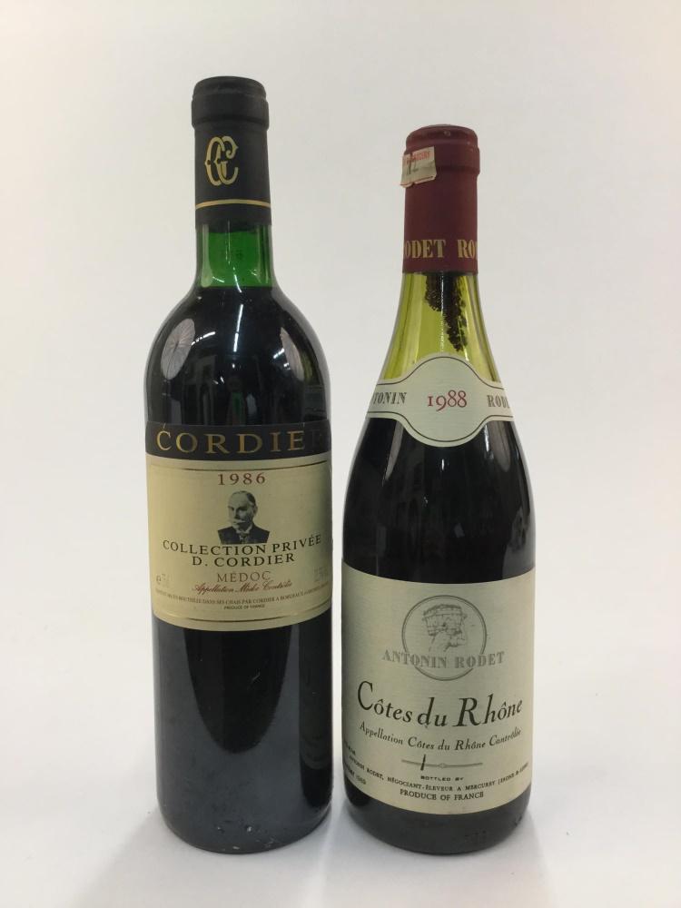 2 French Red Wines.: Two bottles of French red wine, 750ml. ++ 1986 Cordier Medoc, Collection Privee, Bordeaux, France. ++1988 Antonin Rodet, Cotes du Rhone, France._x000D_ Condition: Discolorations, minor chips, and accr