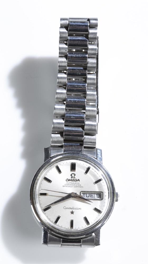 Omega Automatic Constellation Chronometer watch: An Omega Automatic Constellation Chronometer wristwatch. Round stainless steel face with metal links. Marked on face "Omega Automatic Chronometer Officially Certified." Watch in working order. Closed 