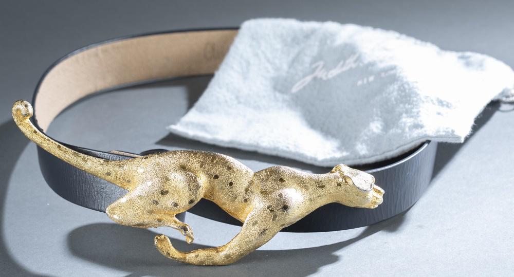 Christopher Ross, Cheetah Buckle and Leather Belt.: A Christopher Ross leather belt and buckle. Running Cheetah 24k gold plated buckle. Signed on inside "Christopher Ross 1992." Blue leather belt. Buckle: 3" x 8 1/2". Belt: Approx, 35"._x000D_ Provenan