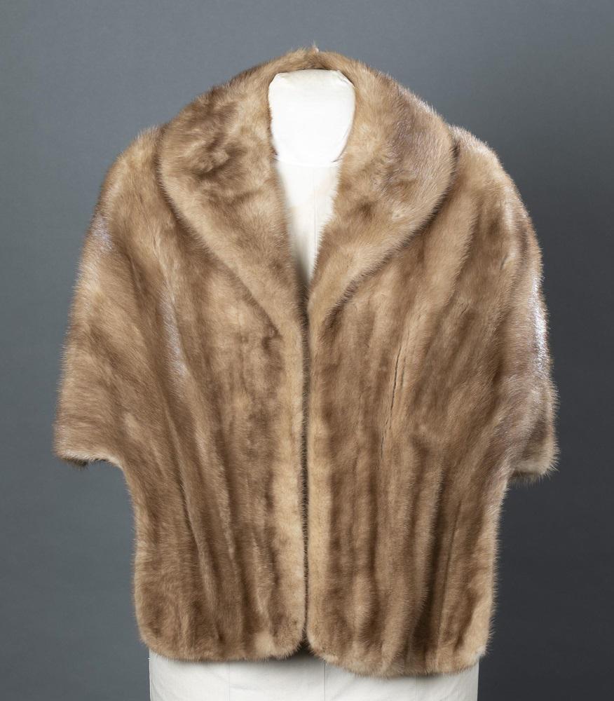 Brown Mink Fur, Jordan Marsh, Stole.: A brown mink fur stroller by Jordan Marsh. Brown silk lining with personal embroidery. Label reads "Jordan Marsh." Shoulder: Approx, 18". Length: Approx, 21".