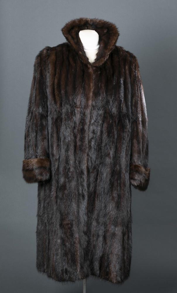 Brown Mink Fur, Coat.: A brown mink fur coat having two front fasteners. Purple silk lining embroidered with flowers. Wear/ fraying to lining inside of left arm. Bust: Approx, 52". Length: Approx, 48".