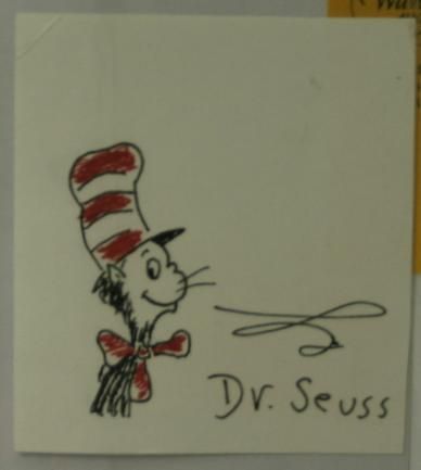 Dr. Seuss/Drawing. Cat In The Hat.: Dr. Seuss/Drawing. Cat In The Hat. **3 inch color drawing signed by Dr. Seuss with his characteristic squiggle.** Fine. This item is part of the Important Collection of Dr. Suess Books & Ephemera used