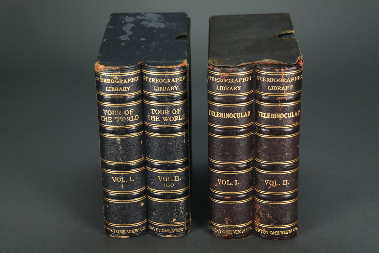 Stereoscope Viewer & 94 slides 2 boxes: [Photography] Keystone View Company Stereoscope Viewer and 94 slides from the Stereographic Library. Viewer and slides housed in their own boxes, made to appear like books._x000D_ Condition Good to ve