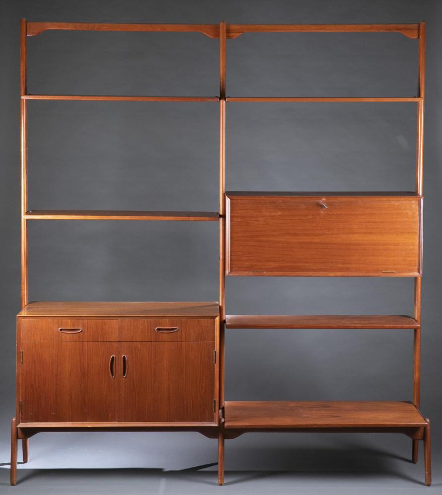 Erik Buch style, "V system" wall unit.: An Erik Buch (Danish, 1923-1982) style "V System" freestanding wall unit. Mid 20th century. Teak. Five shelves, one drop front desk, and one two drawers over one cabinet. Some hinges are loose or part