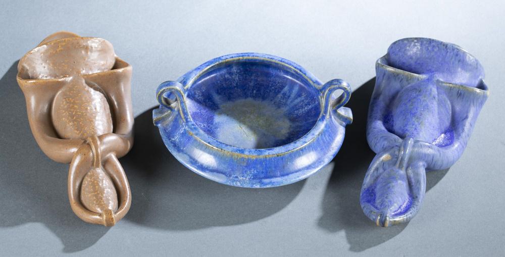 3 Fulper pottery pieces, 20th century.: A group of three Fulper Pottery pieces in matte glazes. 20th century. New Jersey. ++ Two wall pockets, one venetian blue one cat's eye. Each pocket has three openings and looped motif. Rectangular ink