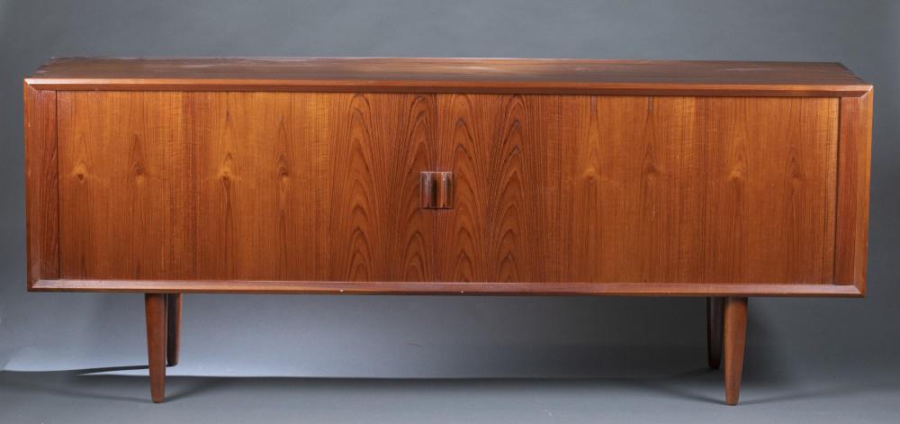 Svend Aage Larsen style, tambour credenza.: A Svend Aage Larsen for Faarup style, tambour credenza. Mid 20th century. Teak. Two sliding tambour doors opening to drawers and storage space. Unmarked. Slightly wobbly. Evidence of repaired cracks o