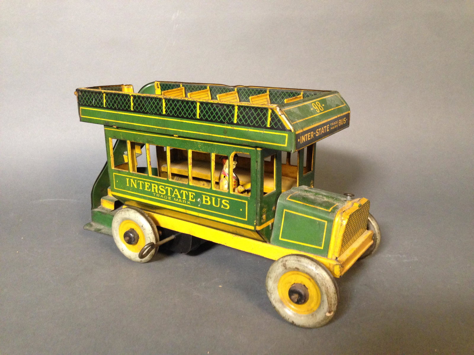 Strauss Tin Wind Up Inter-State Double Decker Bus: Vintage German Strauss Tin Wind Up Inter-State Double Decker Bus 98 with Integral Driver ++ 10.5" x 5" x 6"_x000D_ Condition: Mechanism untested. Light rust across body and and wear on tires. Back sta