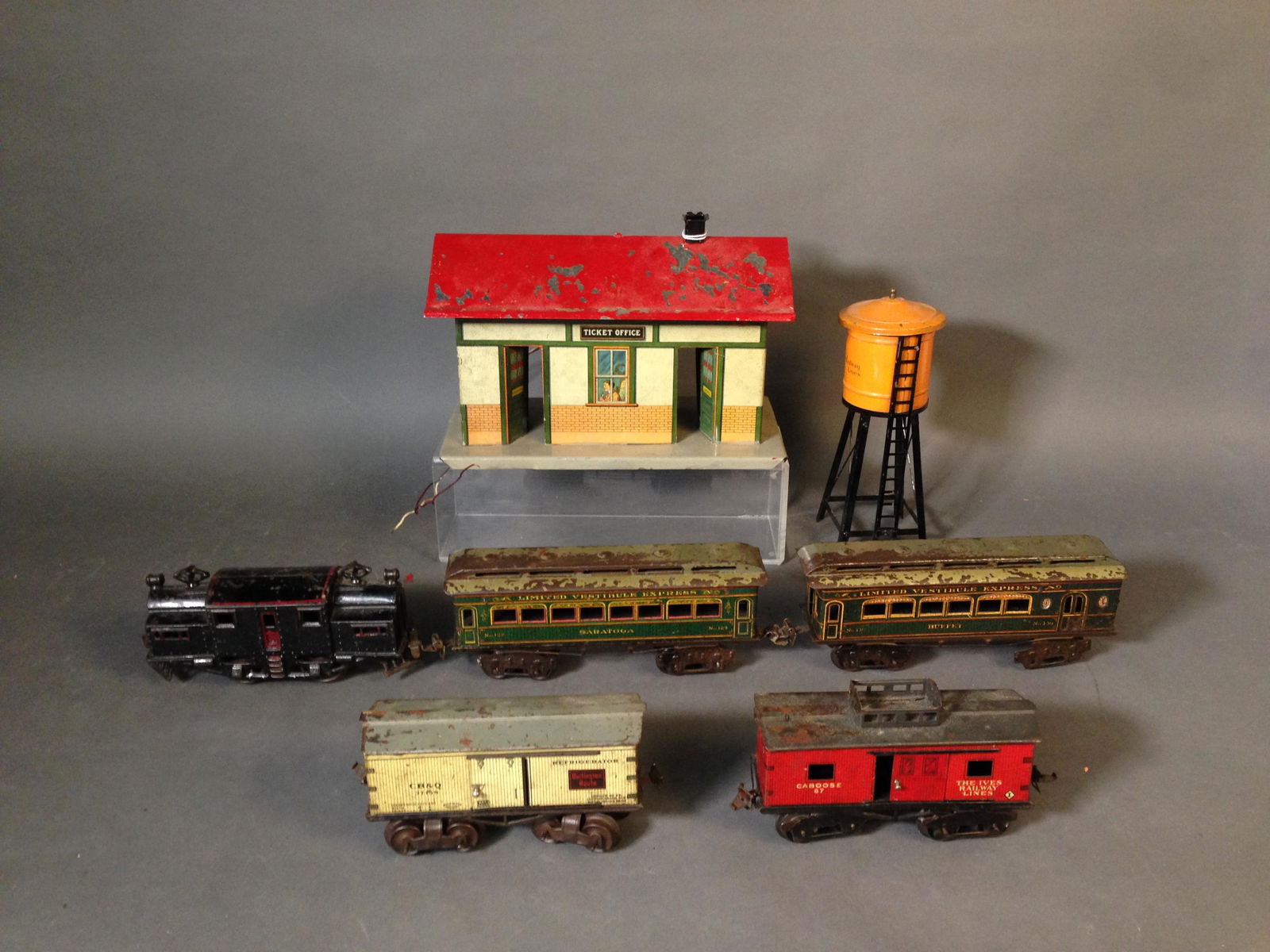 Prewar Ives Electric Train Set O Gauge: Prewar Ives Electric Train Set O Gauge, Train Station, &Water Tower ++ Electric cast iron engine 7.5" long ++ Two tin litho Limited Vestibule Express 129 Saratoga and 130 Buffet cars ++ Two tin litho