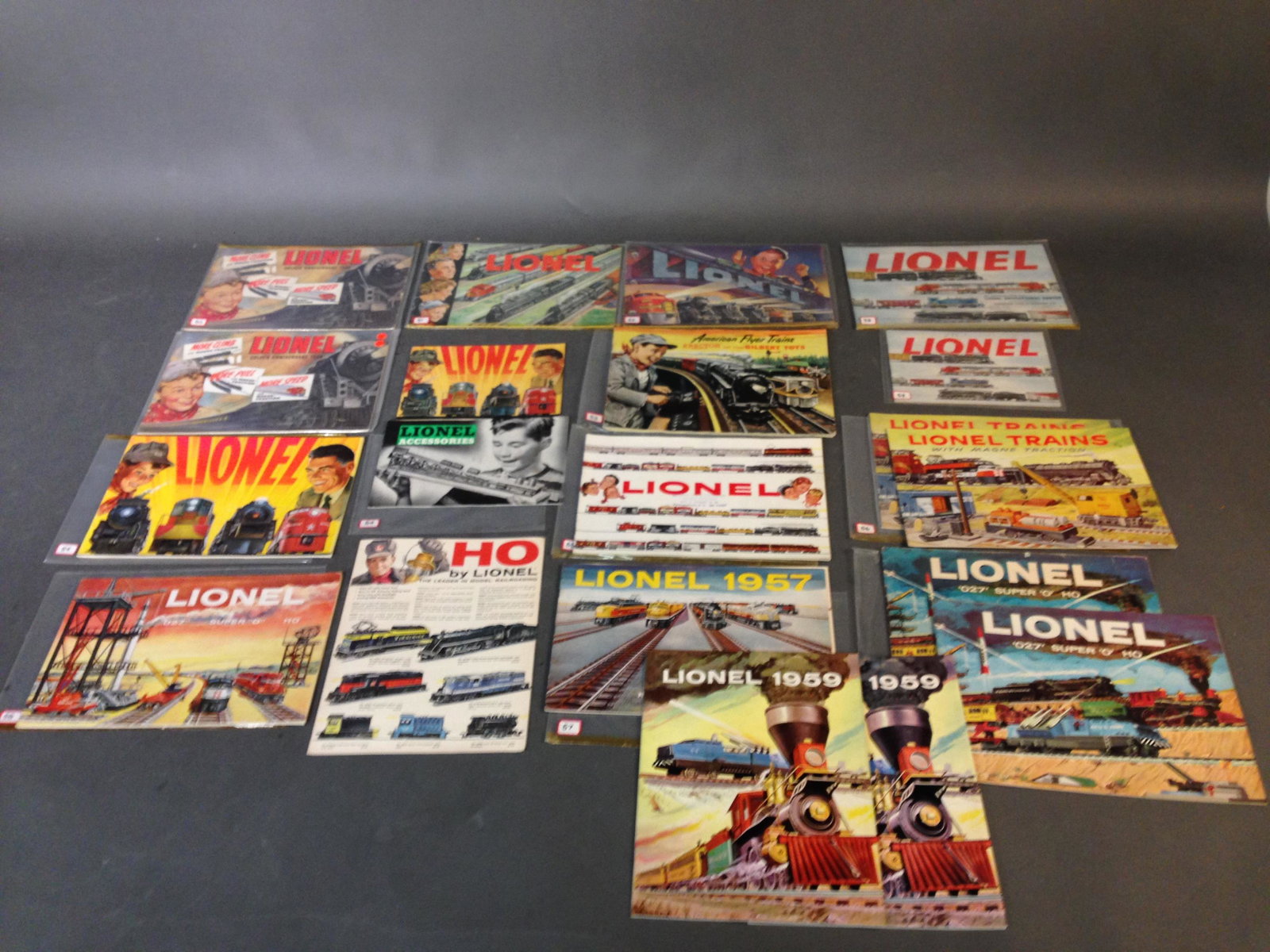 12 1950s Lionel & 1 Gilbert Toys Catalogues: Twelve 1950s Lionel & One Gilbert Toys Catalogues ++ Two 1950 catalogue, including Near Mint 1950 with light creasing on spine and "1950" written on cover ++ Good 1951 catalogue with 1951 written on c