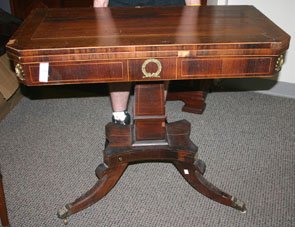 Flip-top pedestal game table with inlay