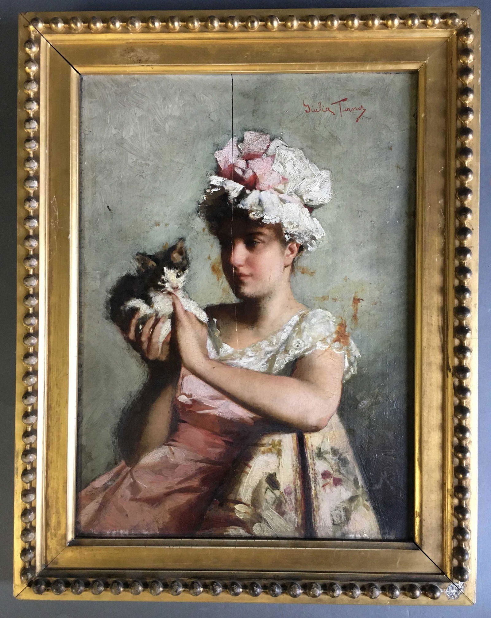 Giulia Turner. Oil on board: portrait of a girl.: Giulia Turner. Antique oil on board: portrait of a girl holding a cat. Board: 12 7/8" x 9 3/4". Contemporary frame: 15 3/4" x 12 1/4".