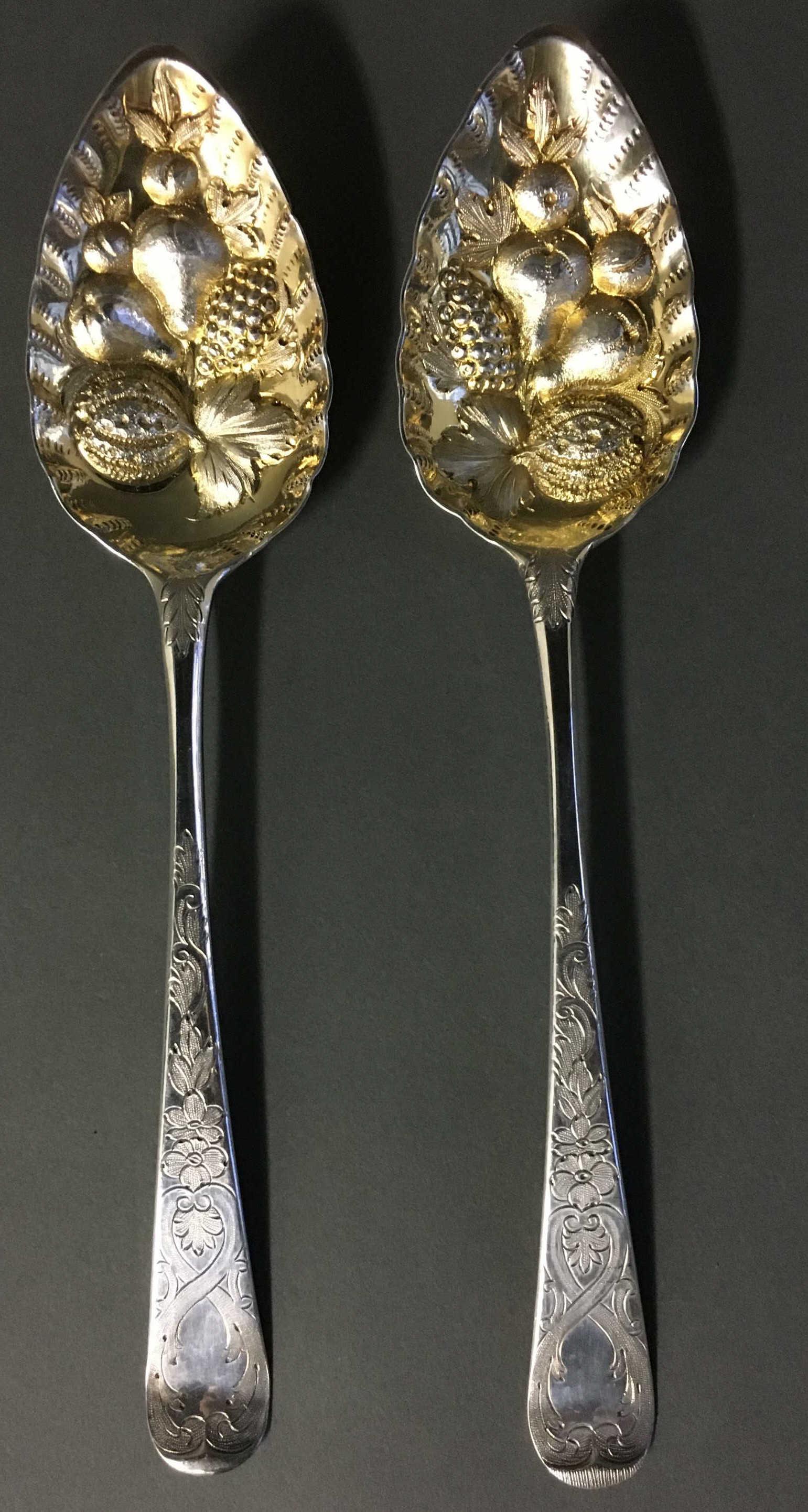 Pair of sterling Edinburgh Scottish serving spoons: Pair of sterling Edinburgh Scottish serving spoons, 1748, Robert Wilson. Length: 9 in. Weight: 4.215 oz. In presentation box.