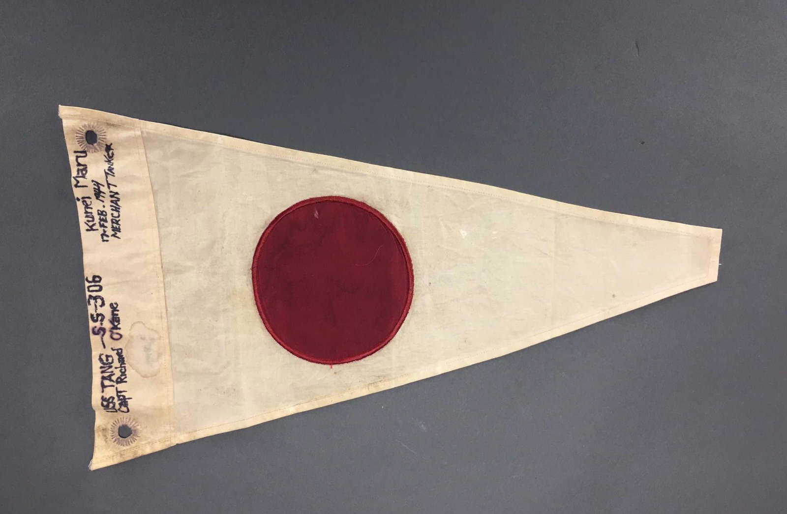WWII Japanese Pennant. Labeled O'Kane.: [Ephemera] WWII Japanese Flag Pennant. Written in felt tip: "USS Tang -S.S.-306 Capt Richard O'Kane: and "Kunei Maru 17-Feb. 1944 Merchant Tank". O'Kane received the Medal of Honor "For conspicuous ga