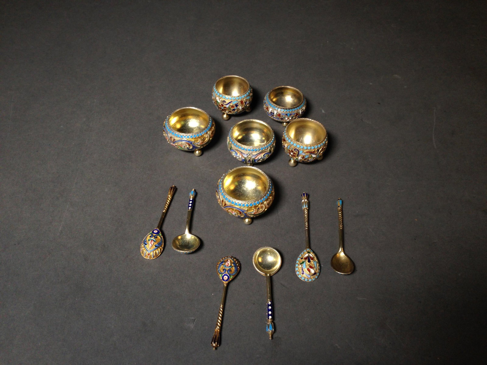 6 Imperial Russian Enamel .875 Silver Salt Cellars: Six 19th Century Imperial Russian Enameled 84 .875 Silver Salt Cellars by Mikhail Fyodorovich Sokolov, Moscow ++ 7.38 ozt. ++ Tallest cellar 1" tall and spoon 2.5" long_x000D_ Condition: Like new cond