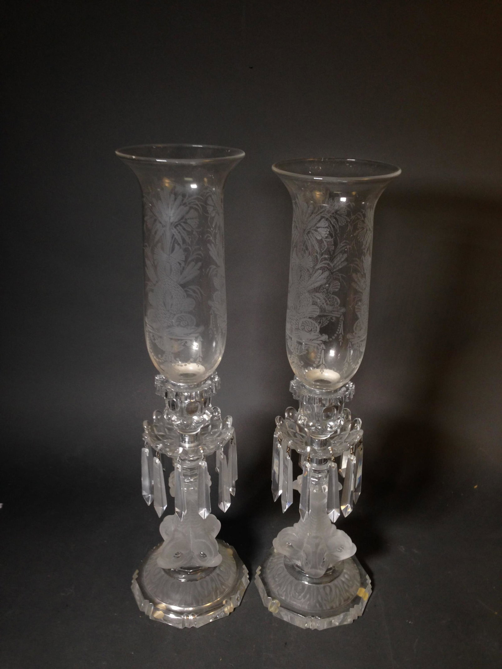 Pair of St Louis Frosted Hurricane Candleholder: Pair of St Louis Frosted Hurricane Lustre Candleholder ++ Having frosted dolphin form base and etched shades ++ 21.75" tall_x000D_ Condition: No visible chips or scratches.