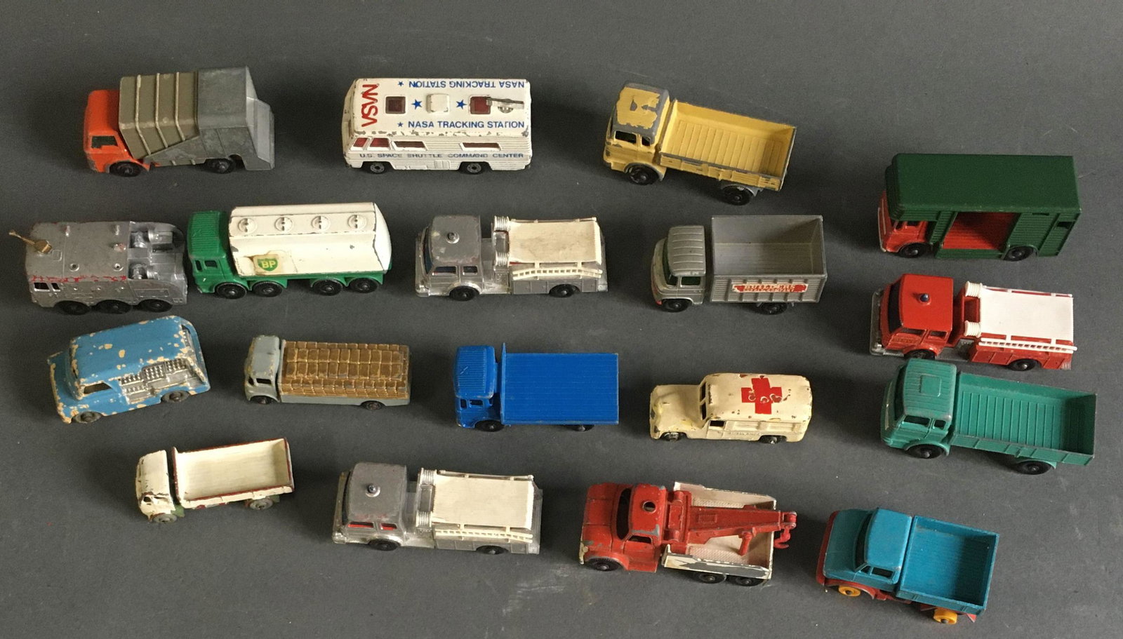 18 Matchbox trucks issued by Lesney, England: 18 Matchbox trucks issued by Lesney, England. Mostly undated, one with 1968 copyright on underside.