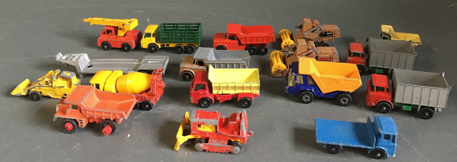 16 Matchbox construction trucks, 13 by Lesney.: 16 Matchbox construction trucks, including 13 issued by Lesney, England. Length: Approx. 2 1/2" to 2 3/4".