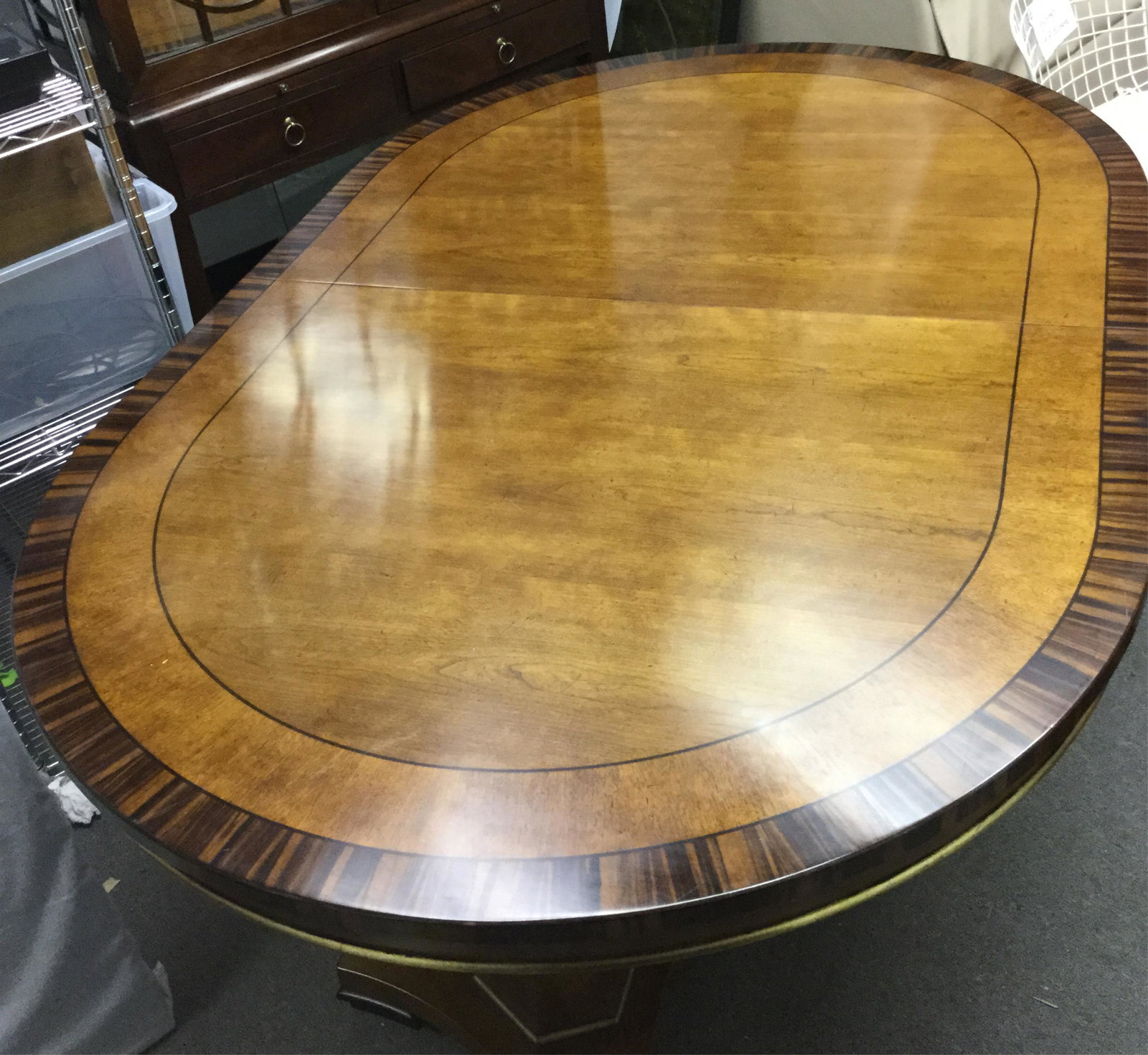 Baker Pedestal Dining Table with 2 Leaves: Baker Pedestal Dining Table with two additional leaves. _x000D_ Measuring: 30" x 48" x 75"