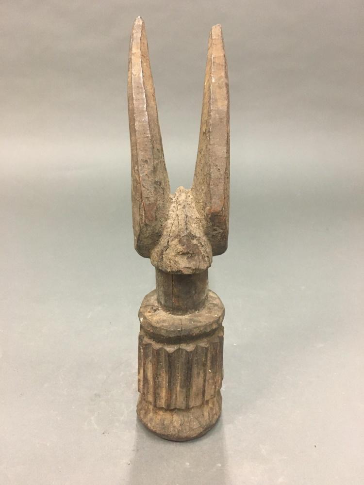 Ikenga Figure. 20th c.: An Ikenga figure. Nigeria. Wood. 20th century. 10 3/4" x 2 3/4" x 3". Crack in right side. Condition: Crack in right side. Some cigarette odor.