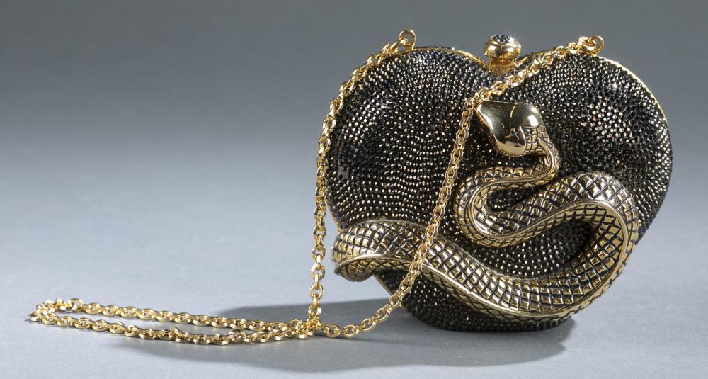 Judith Leiber, crystal snake minaudiere.: A Judith Leiber crystal snake minaudiere. Heart-shaped body covered in brown crystals with gold tone snake. Gold tone frame and shoulder chain. Marked on interior. Includes dust cover. 4 1/4" x 5" x 3