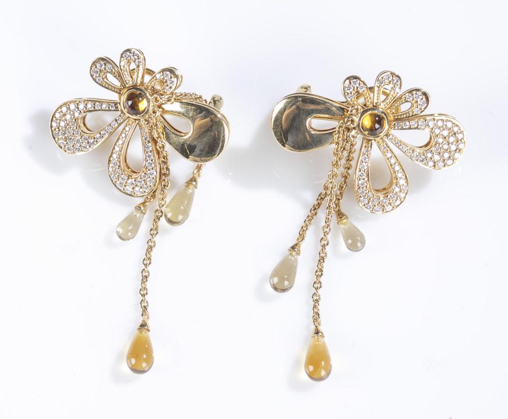 Di Modolo "Fiamma" 18k gold & diamond earrings.: A pair of Di Modolo 18k yellow gold earrings from the Fiamma collection. Floral shaped drop earrings with pave diamonds and citrine stones. French clip backs. Stamped on back. 2 1/4". Approx, 17g.