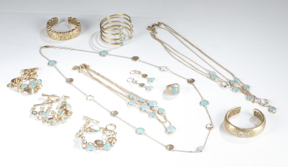11 Rivka Friedman, pieces of jewelry.: A group of eleven Rivka Friedman pieces of jewelry. Textured gold tone with "Caribbean blue" rhinestones. Marked. ++ One pair of dangle earrings. ++ One ring. Size 8. ++ Three toggle clasp bracelets. 