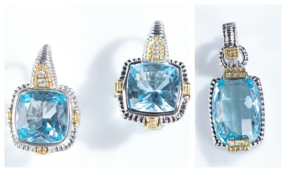 Judith Ripka, sterling & blue topaz set.: A Judith Ripka sterling silver set, including pendant and a pair of earrings from the "JR TWO" collection. With 18k yellow gold and pave cubic zirconia accents and blue topaz stones. Stamped on back.