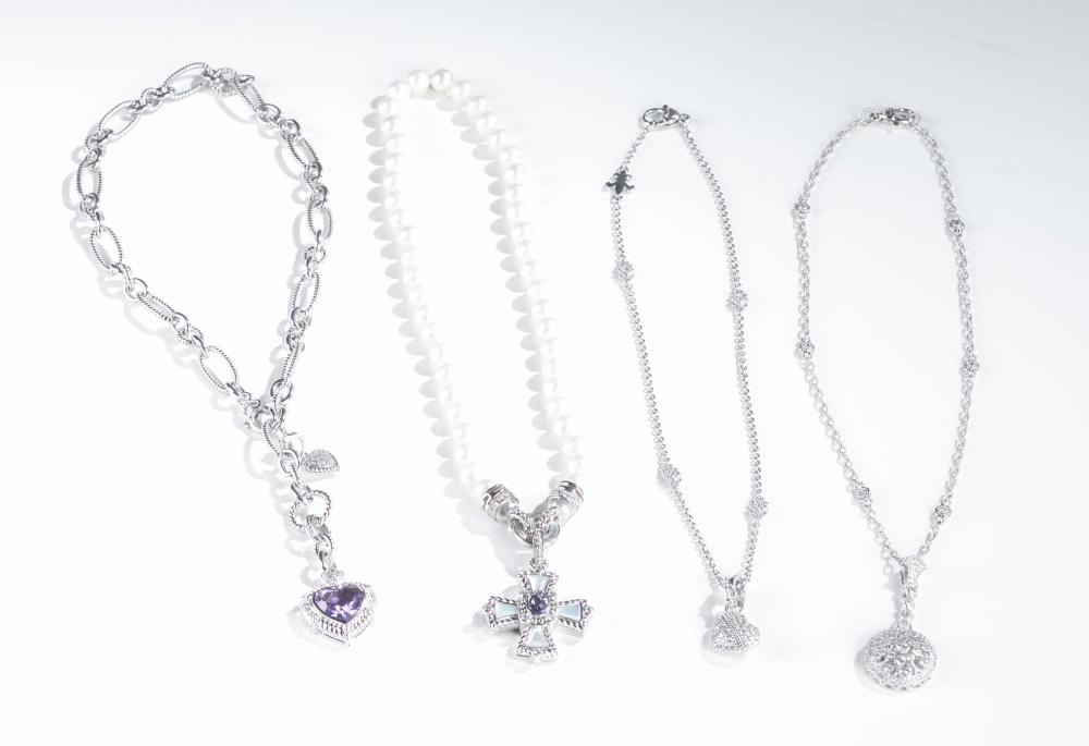 4 Judith Ripka, necklaces.: A group of four Judith Ripka necklaces. ++ Faux pearl front clasp necklace with sterling silver Maltese cross pendant. Pendant has central purple stone , mother of pearl inlay, and cubic zirconia at t