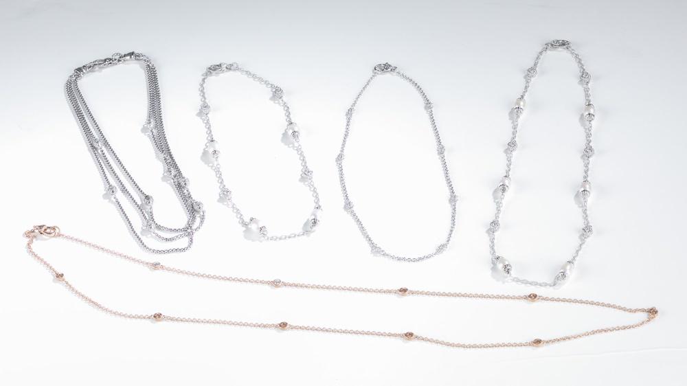 5 Judith Ripka, sterling silver necklaces.: A group of five Judith Ripka sterling silver necklaces with lobster claw clasps. ++Triple layer chain necklace with eight cylinder beads of cubic zirconia. Stamped next to clasp. 17 1/2". Approx, 56g.