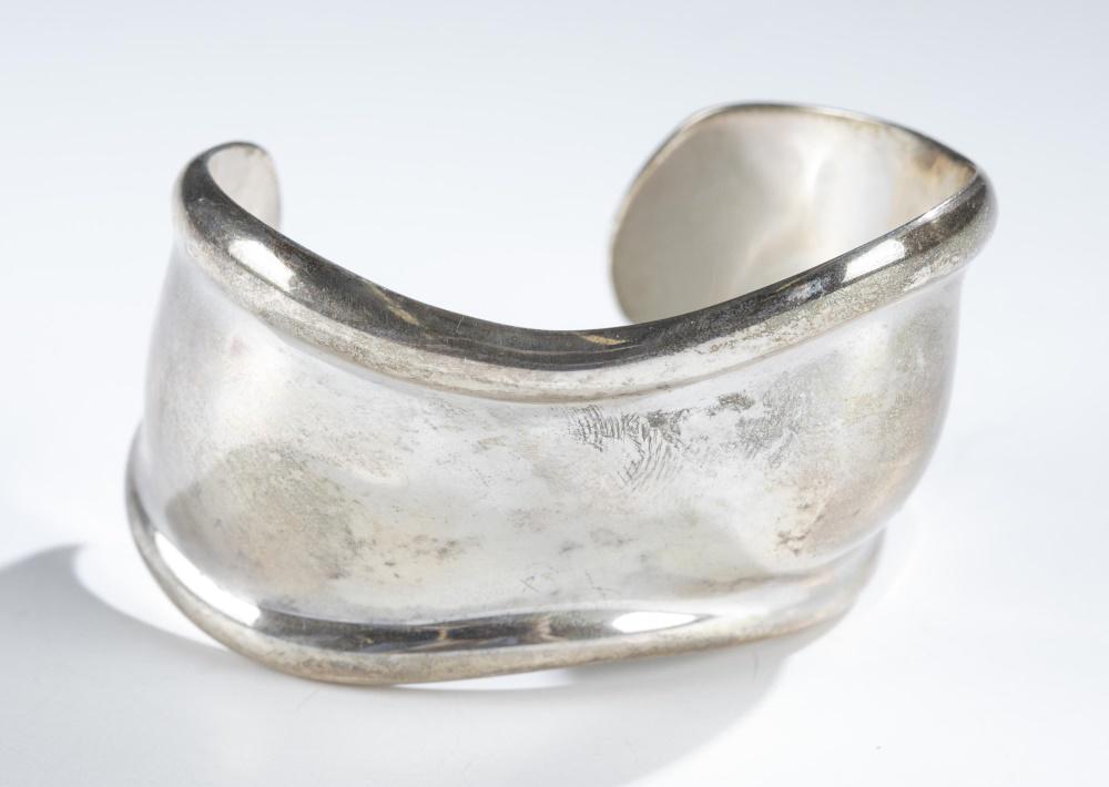 Elsa Peretti for Tiffany & Co., cuff bracelet.: An Elsa Peretti for Tiffany & Co. sterling silver small Bone cuff bracelet. Stamped inside cuff. 1 1/2" x 2 1/4" . Approx, 54g.